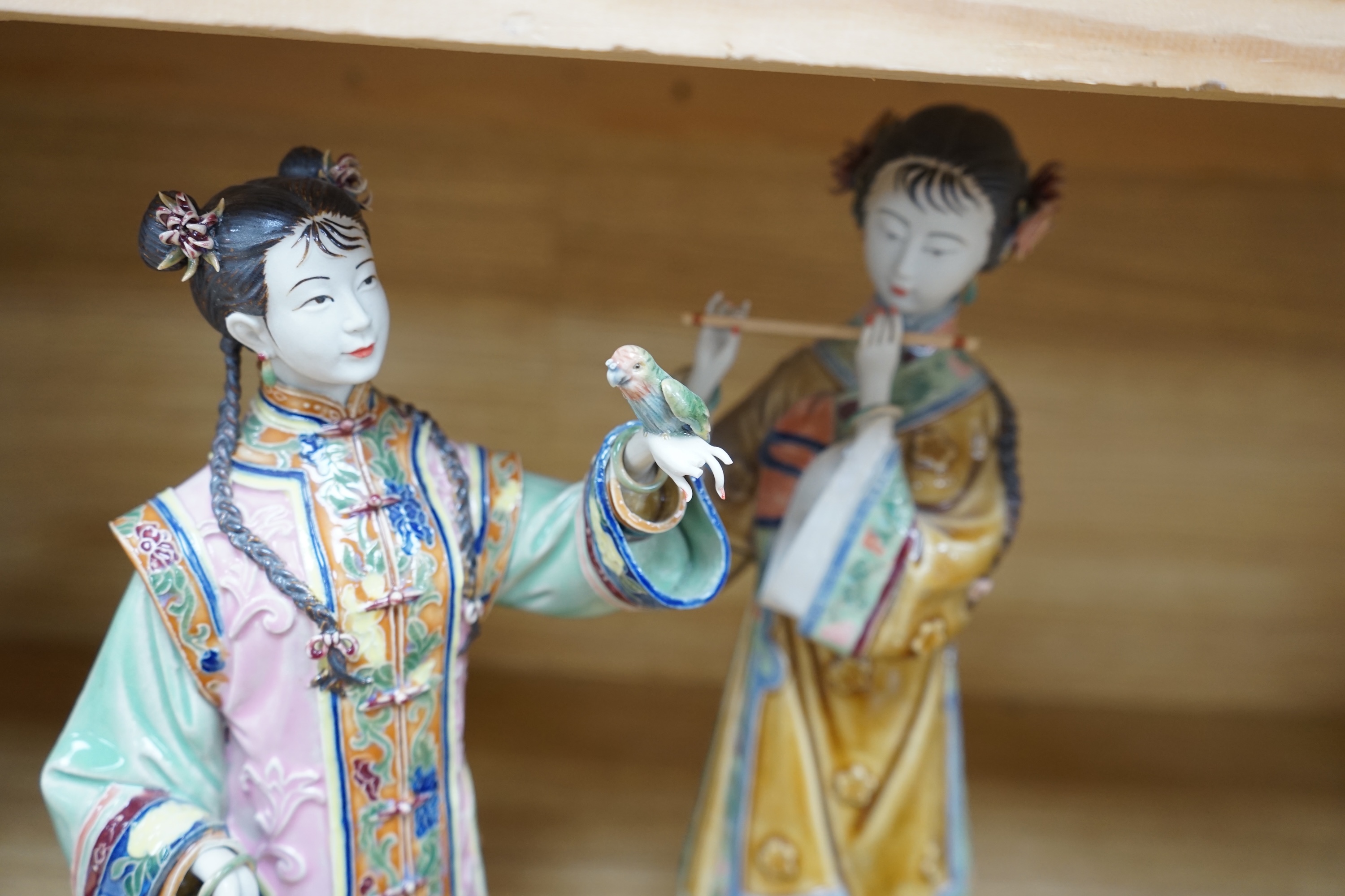 Four Chinese porcelain figures of ladies, tallest 31.5cm. Condition - good.